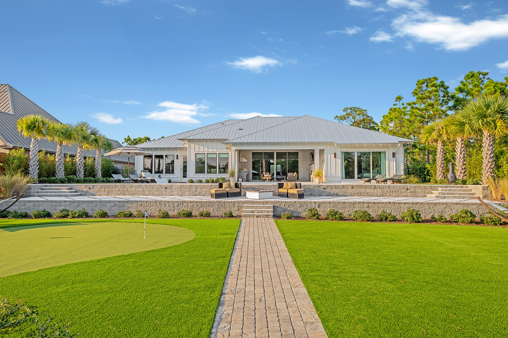 336 East Shipwreck Road Santa Rosa Beach, FL 32459 - Photo 48 of 50 a front view of a house with swimming pool having outdoor seating