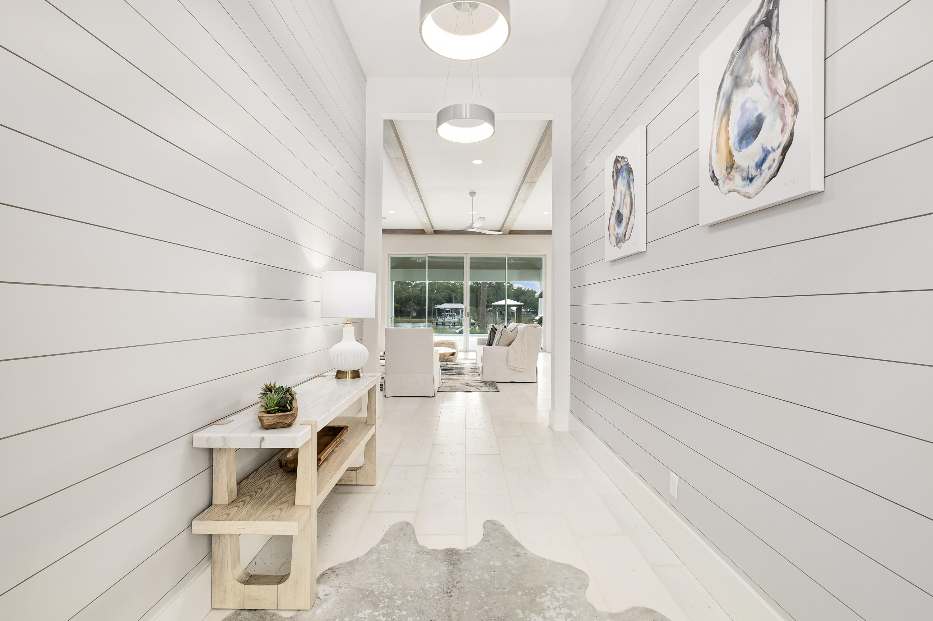 336 East Shipwreck Road Santa Rosa Beach, FL 32459 - Photo 8 of 50 a living room with furniture and a large window