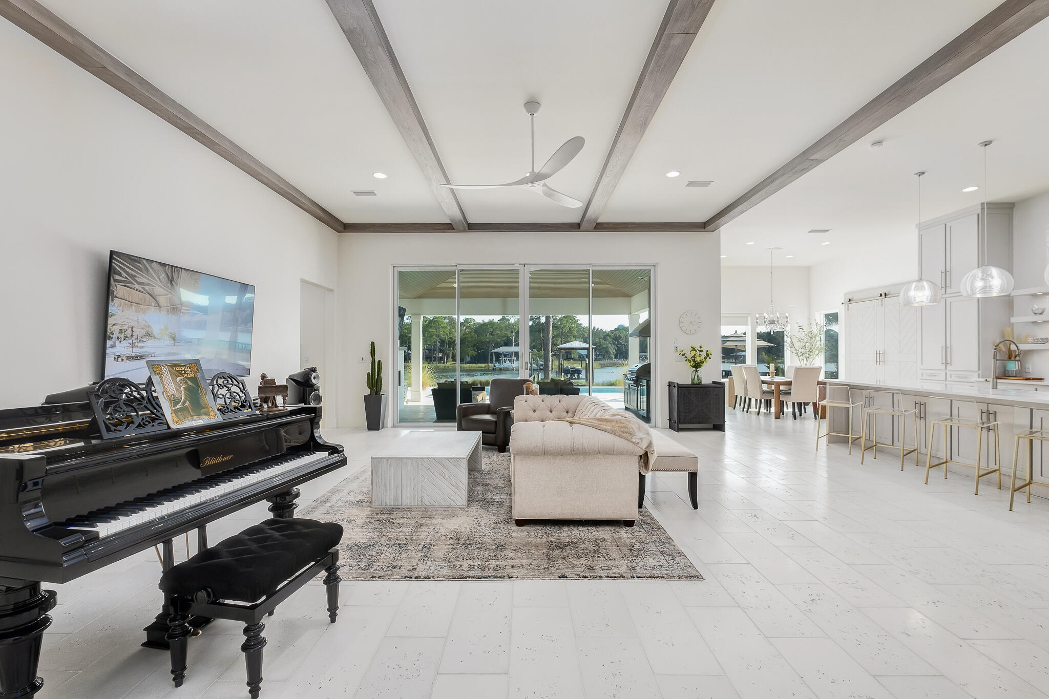 336 East Shipwreck Road Santa Rosa Beach, FL 32459 - Photo 9 of 50 a living room with furniture and a flat screen tv
