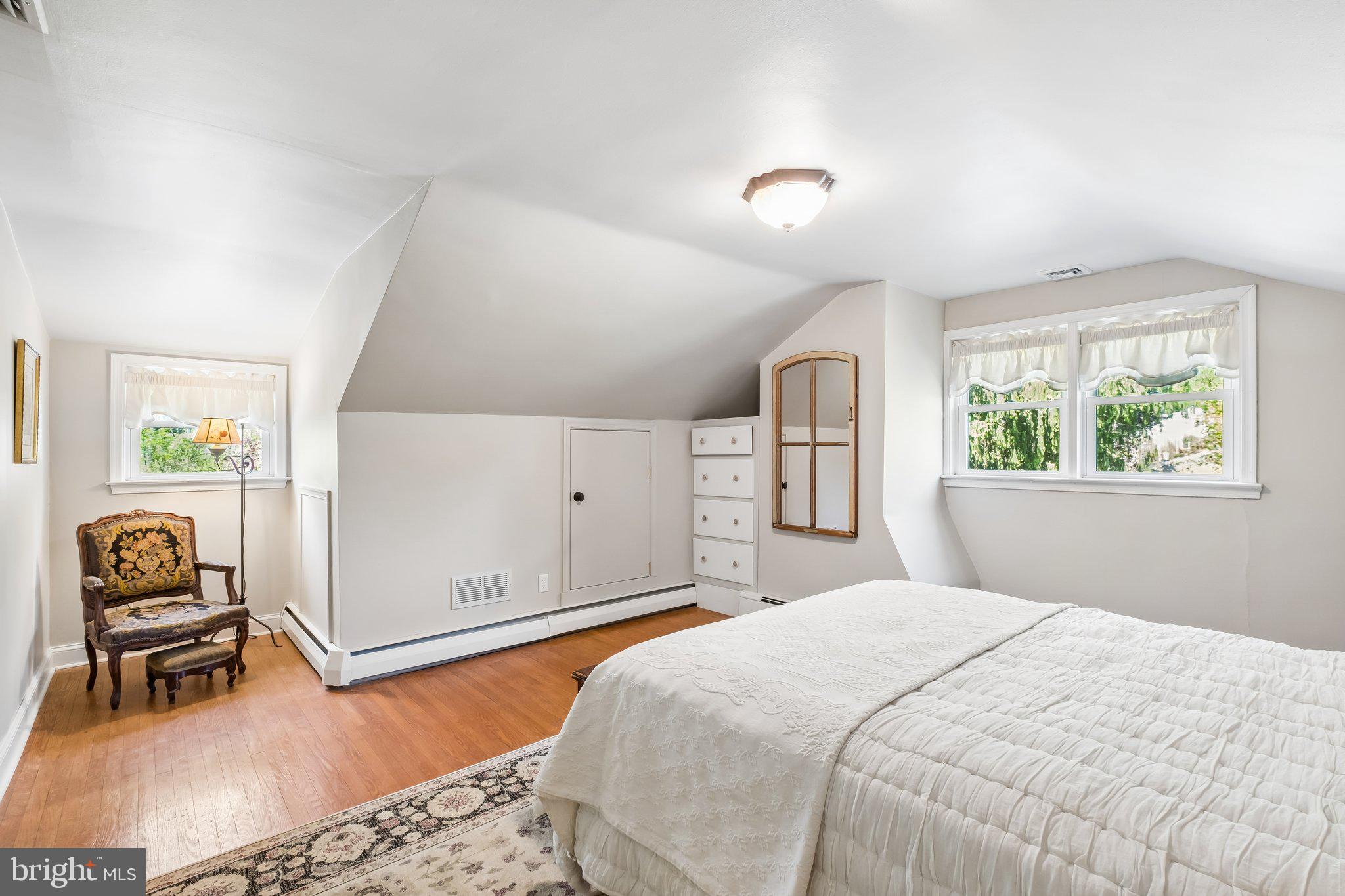 713 Alene Road Ambler, PA 19002 - Photo 25 of 40 a bedroom with a large bed and a window