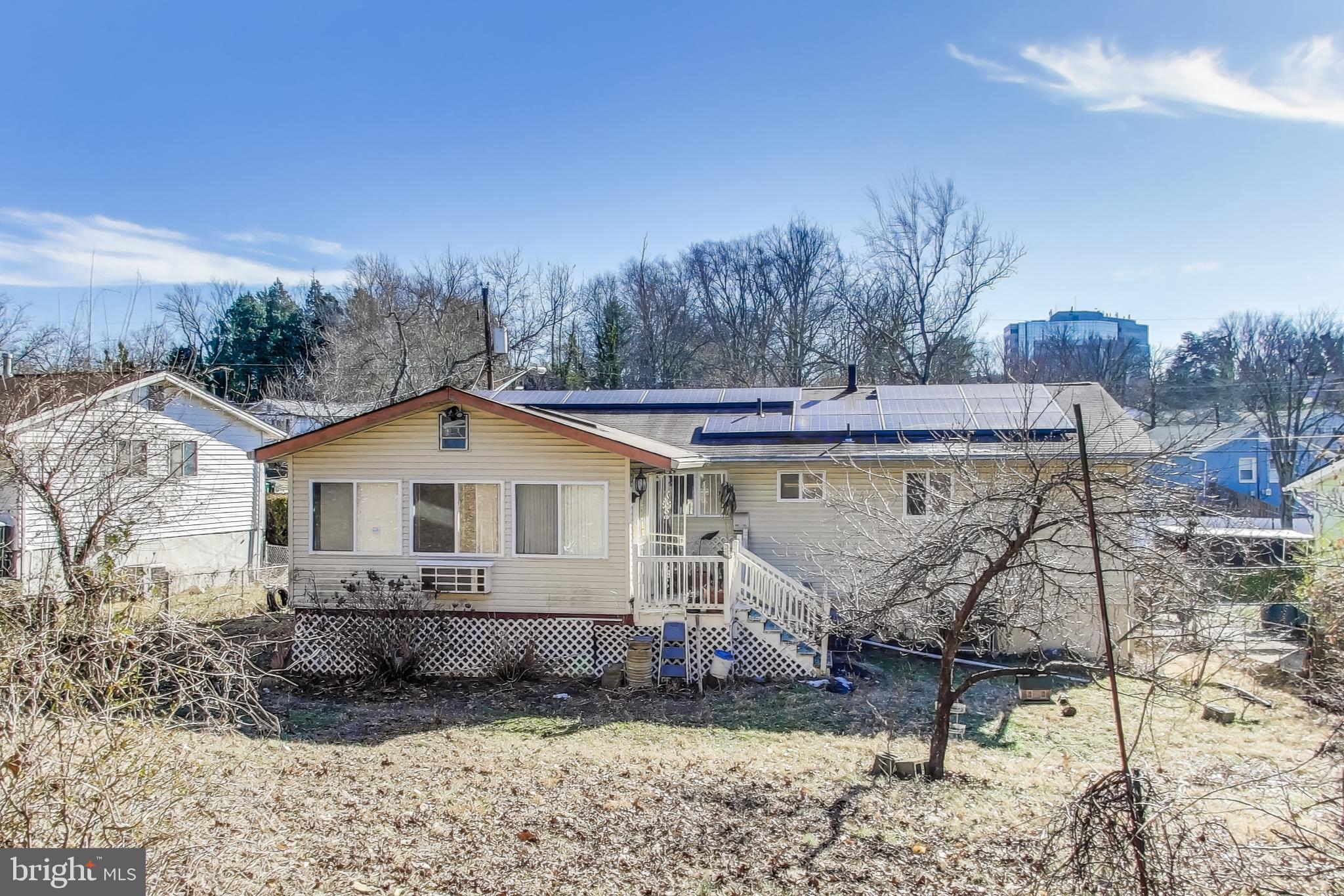 1804 Ironton Drive Oxon Hill, MD 20745 - Photo 12 of 37 a view of a house with a yard and large trees