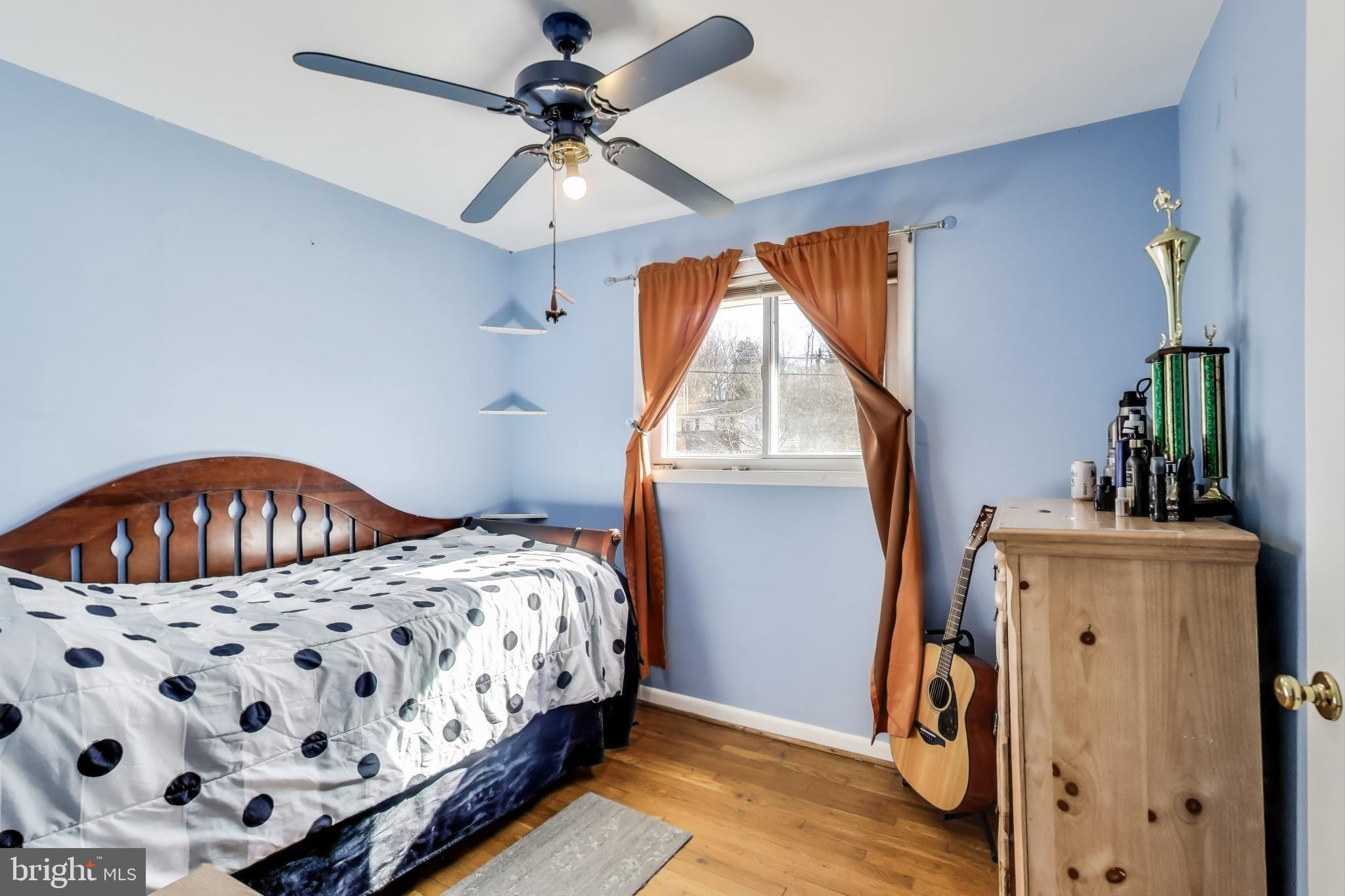 1804 Ironton Drive Oxon Hill, MD 20745 - Photo 13 of 37 a bedroom with a bed and a window