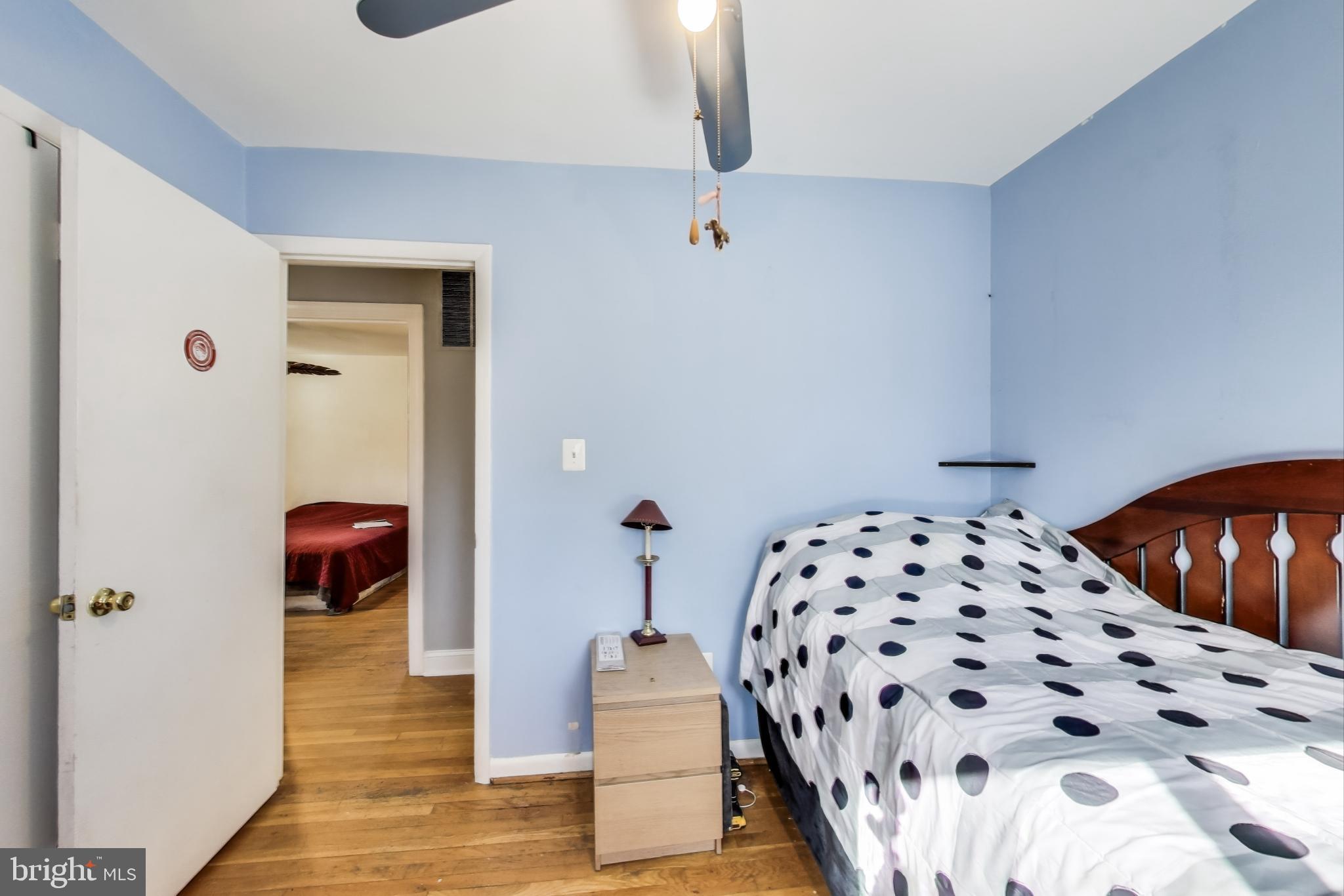 1804 Ironton Drive Oxon Hill, MD 20745 - Photo 15 of 37 a bedroom with a bed and wooden floor