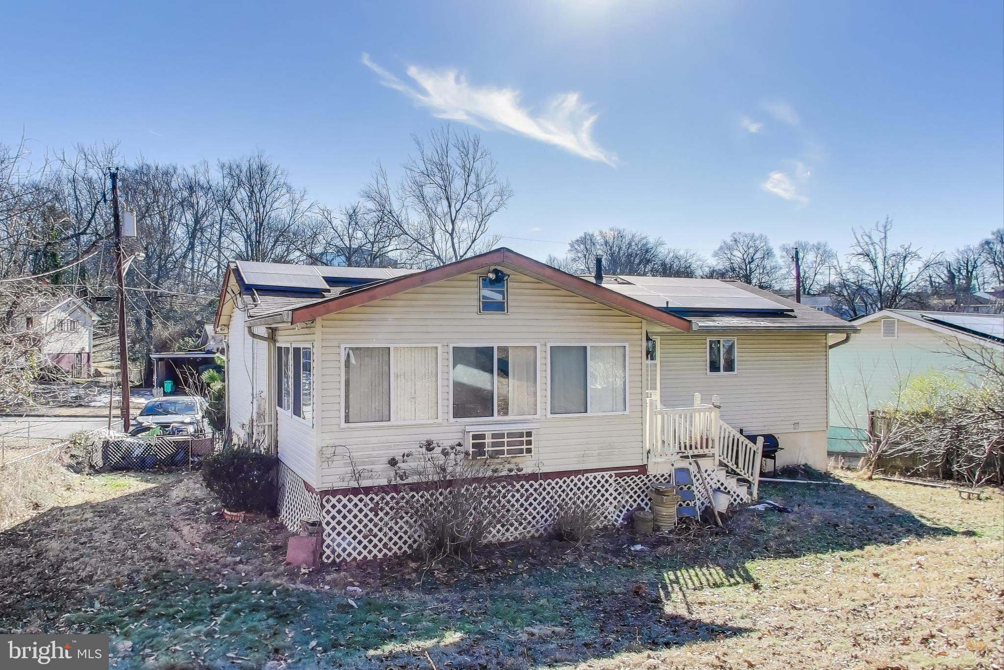 1804 Ironton Drive Oxon Hill, MD 20745 - Photo 22 of 37 a front view of a house with garden