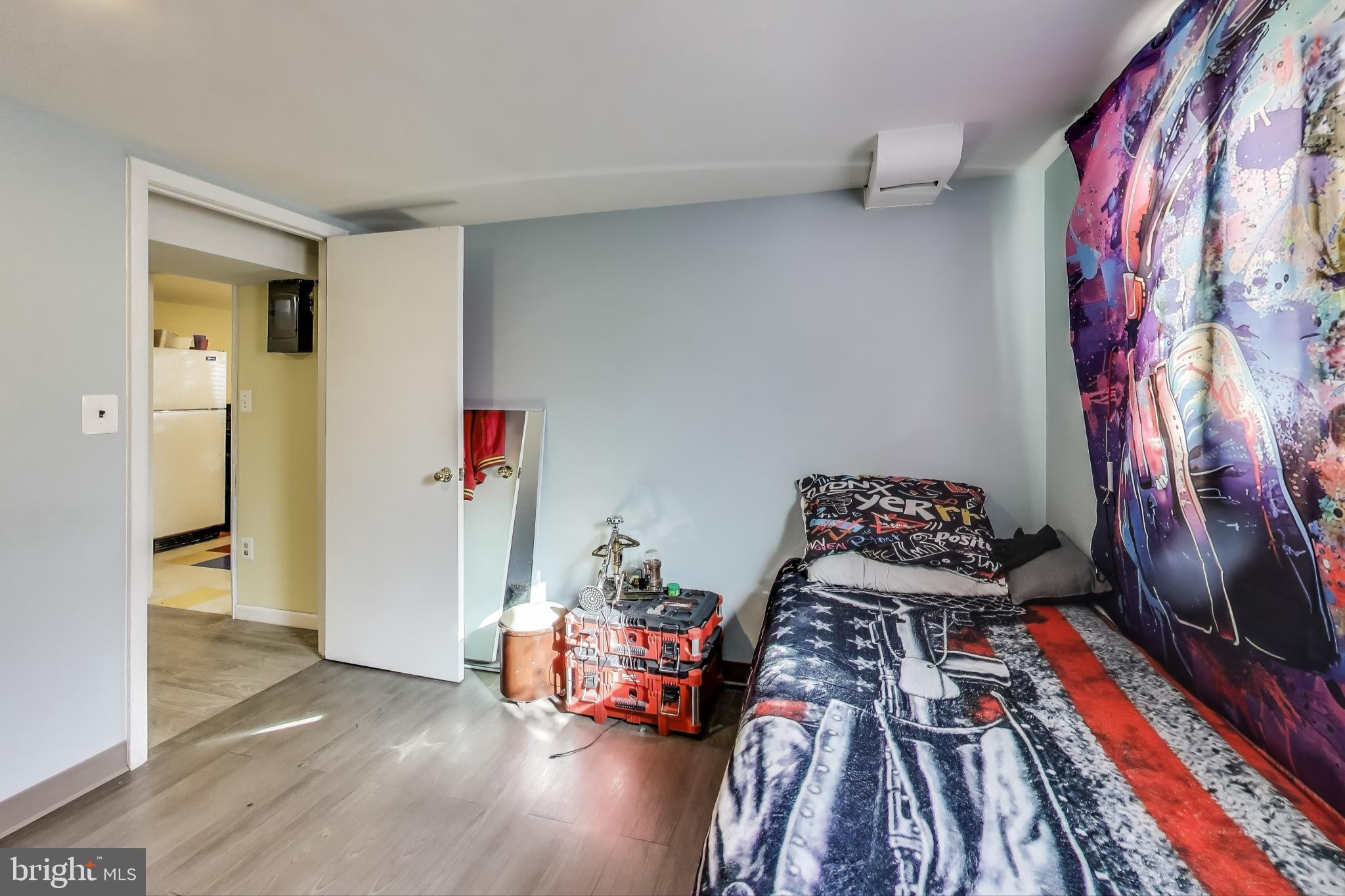 1804 Ironton Drive Oxon Hill, MD 20745 - Photo 25 of 37 a bedroom with furniture and a book shelf