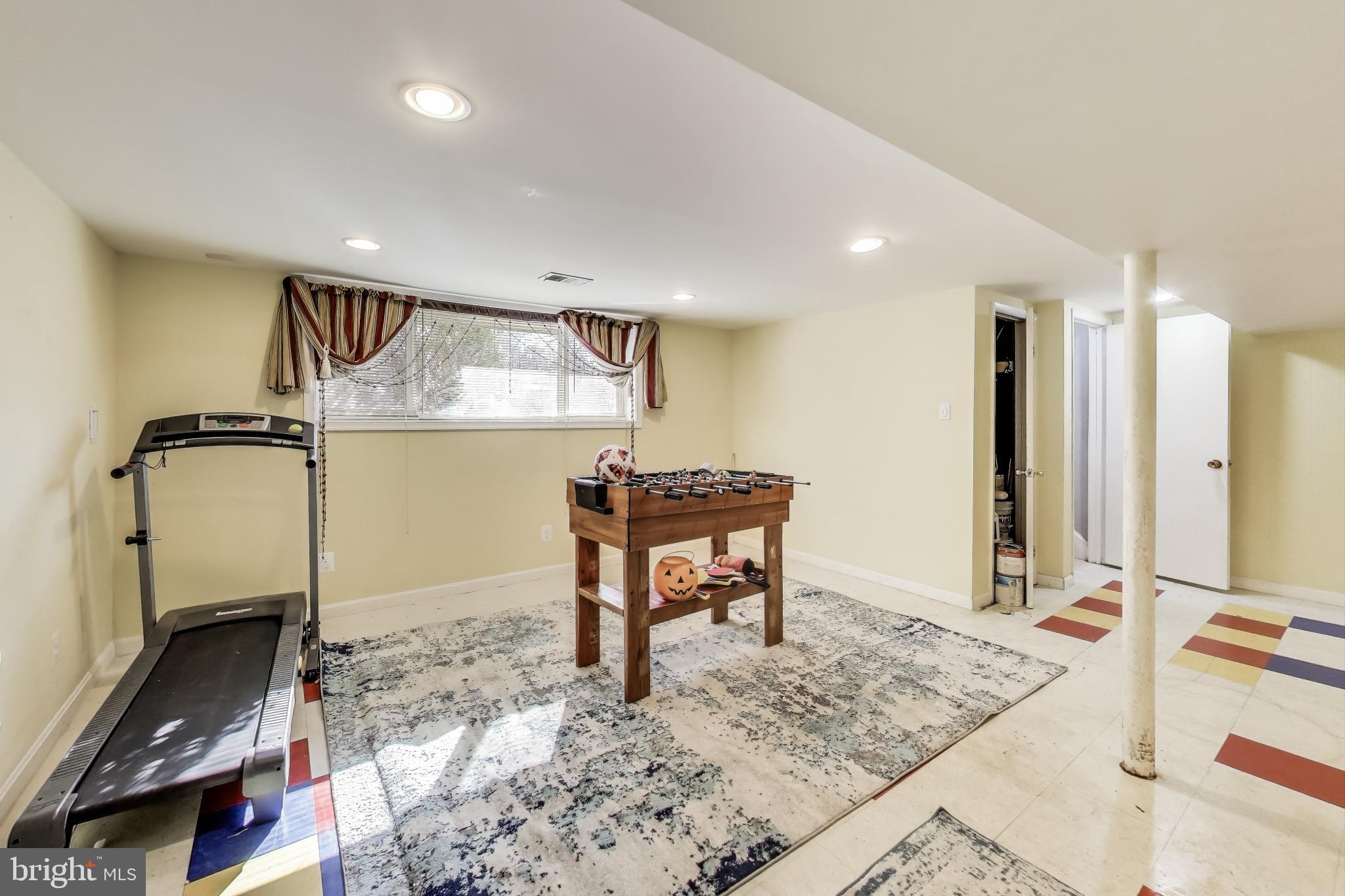 1804 Ironton Drive Oxon Hill, MD 20745 - Photo 30 of 37 a room with table chairs and wooden floor