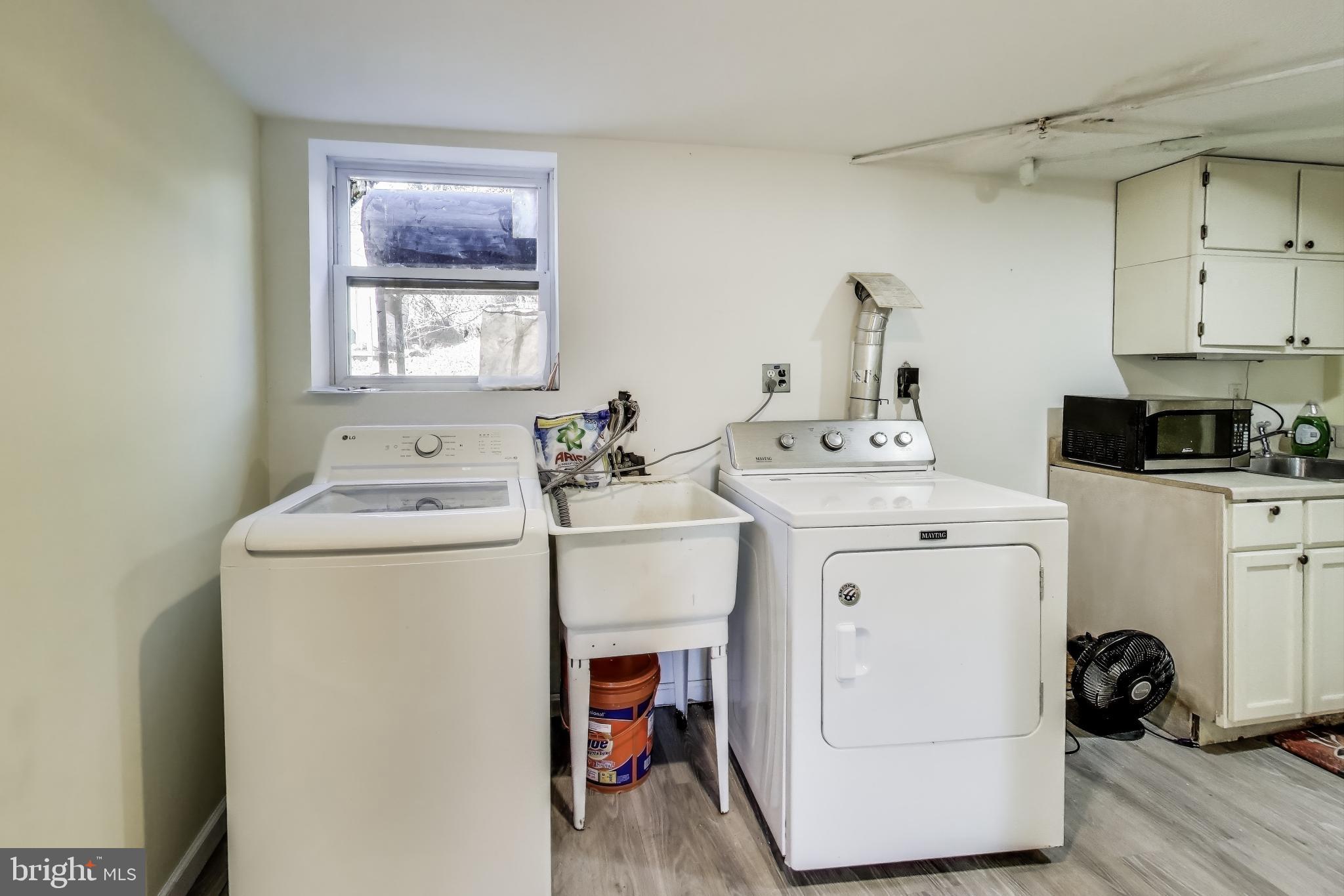 1804 Ironton Drive Oxon Hill, MD 20745 - Photo 31 of 37 a utility room with closet dryer and washer