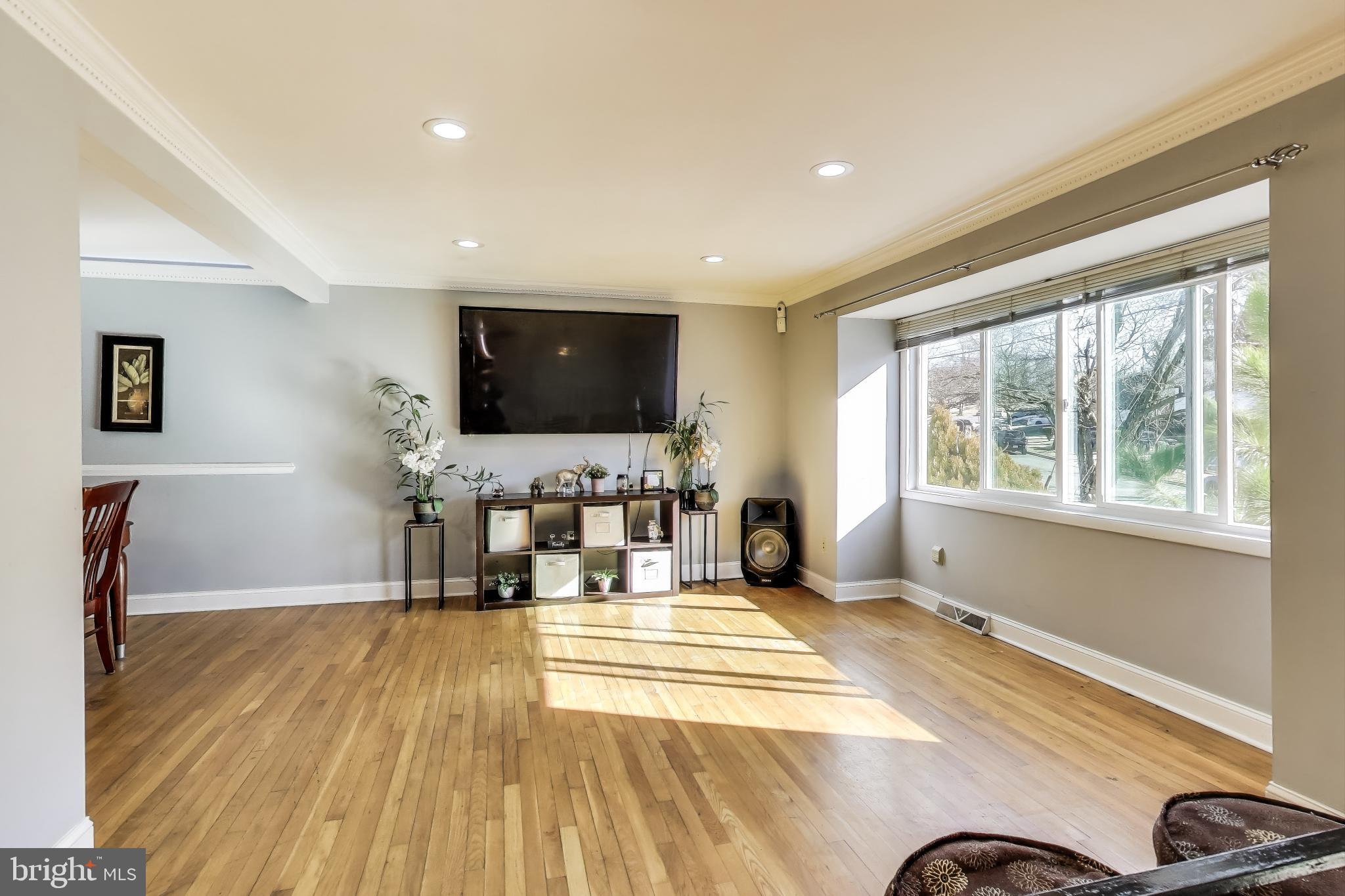 1804 Ironton Drive Oxon Hill, MD 20745 - Photo 4 of 37 a living room with furniture and a flat screen tv