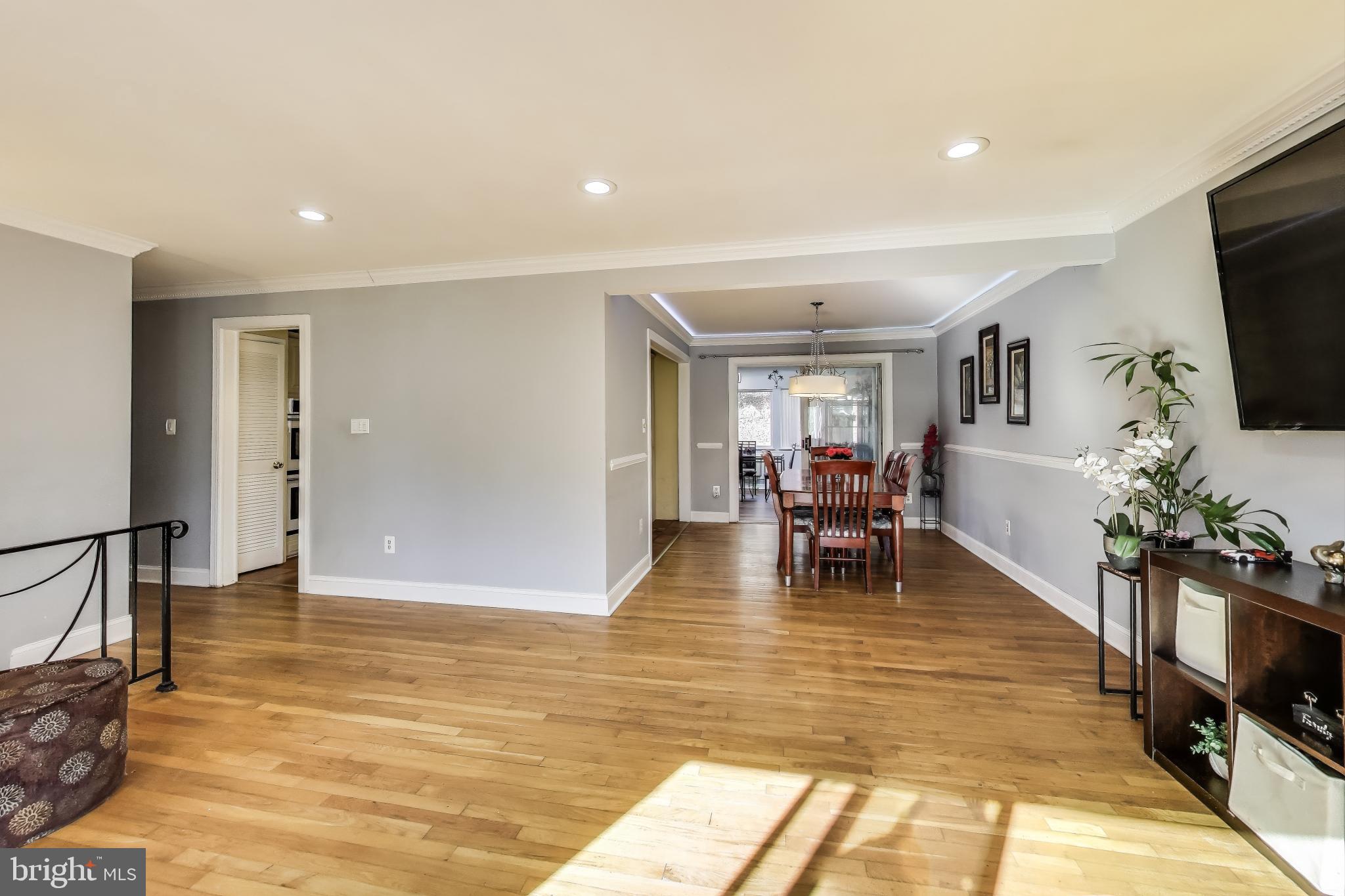 1804 Ironton Drive Oxon Hill, MD 20745 - Photo 5 of 37 a living room with furniture and a flat screen tv