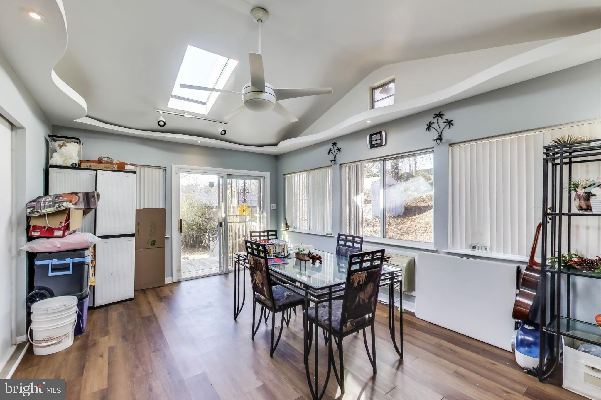 1804 Ironton Drive Oxon Hill, MD 20745 - Photo 8 of 37 a view of a dining room with furniture window and wooden floor