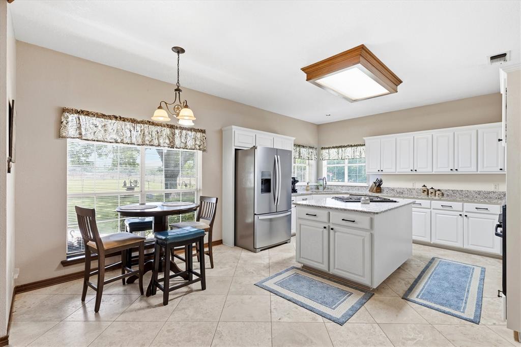 219 Friends Road Denison, TX 75021 - Photo 11 of 40 Kitchen with dining area