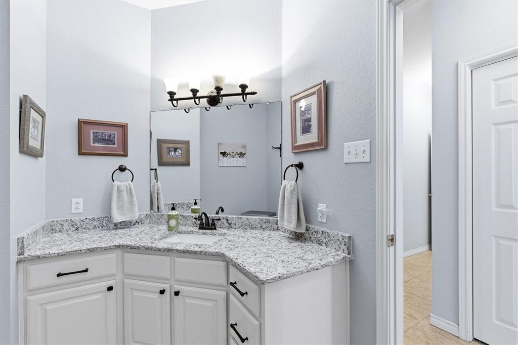 219 Friends Road Denison, TX 75021 - Photo 20 of 40 Guest bathroom- new counter tops-sink-faucets