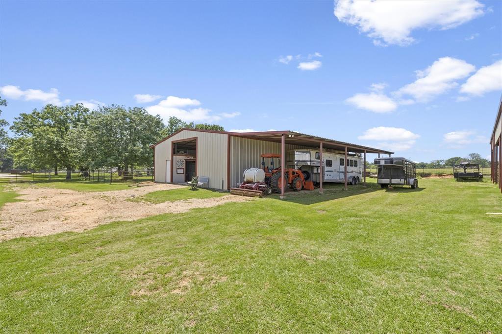219 Friends Road Denison, TX 75021 - Photo 32 of 40 Barn with lean to for equipment