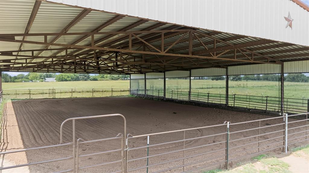 219 Friends Road Denison, TX 75021 - Photo 33 of 40 Covered riding arenascreens on one side