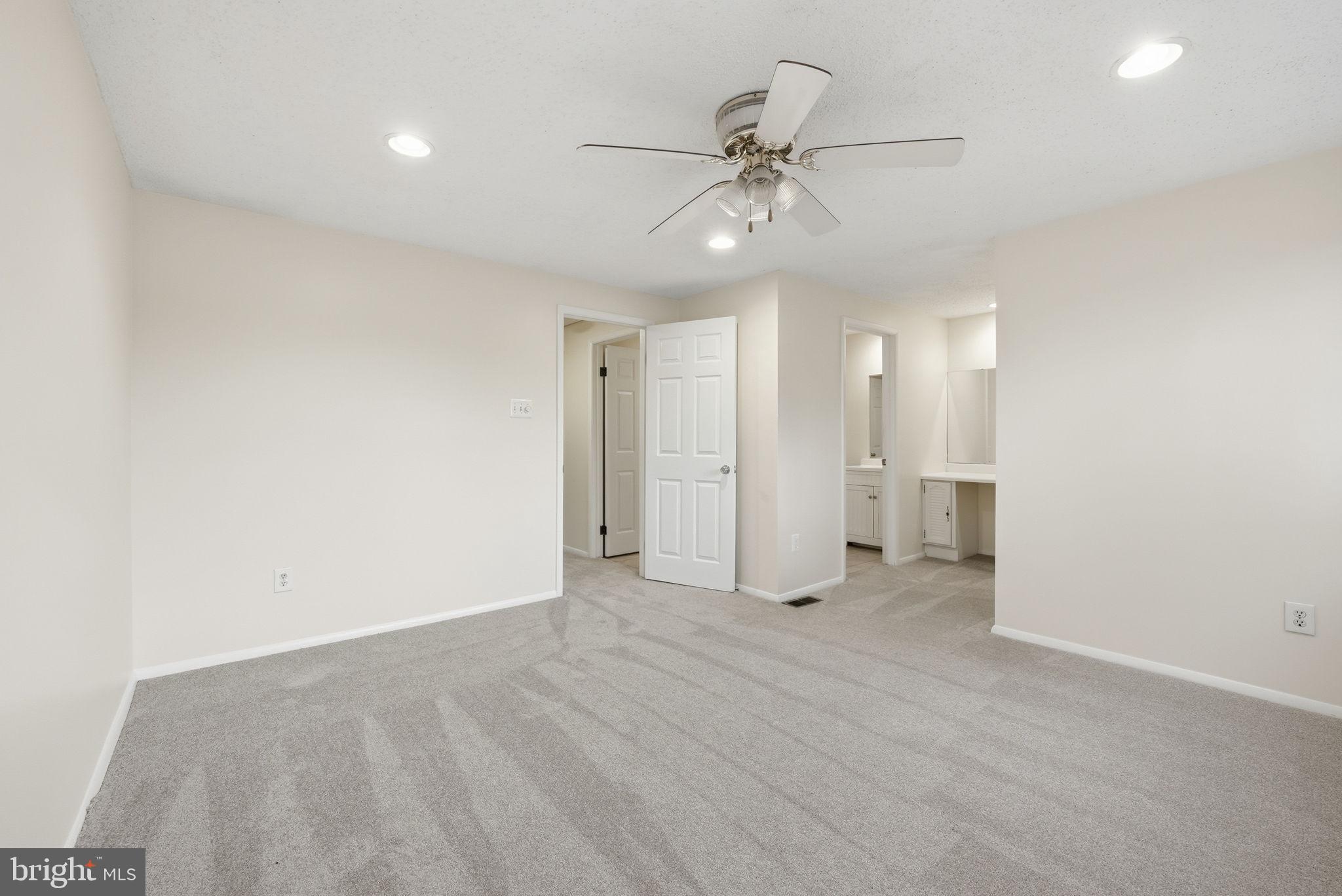 9804 Gabon Court Burke, VA 22015 - Photo 16 of 30 a view of an empty room