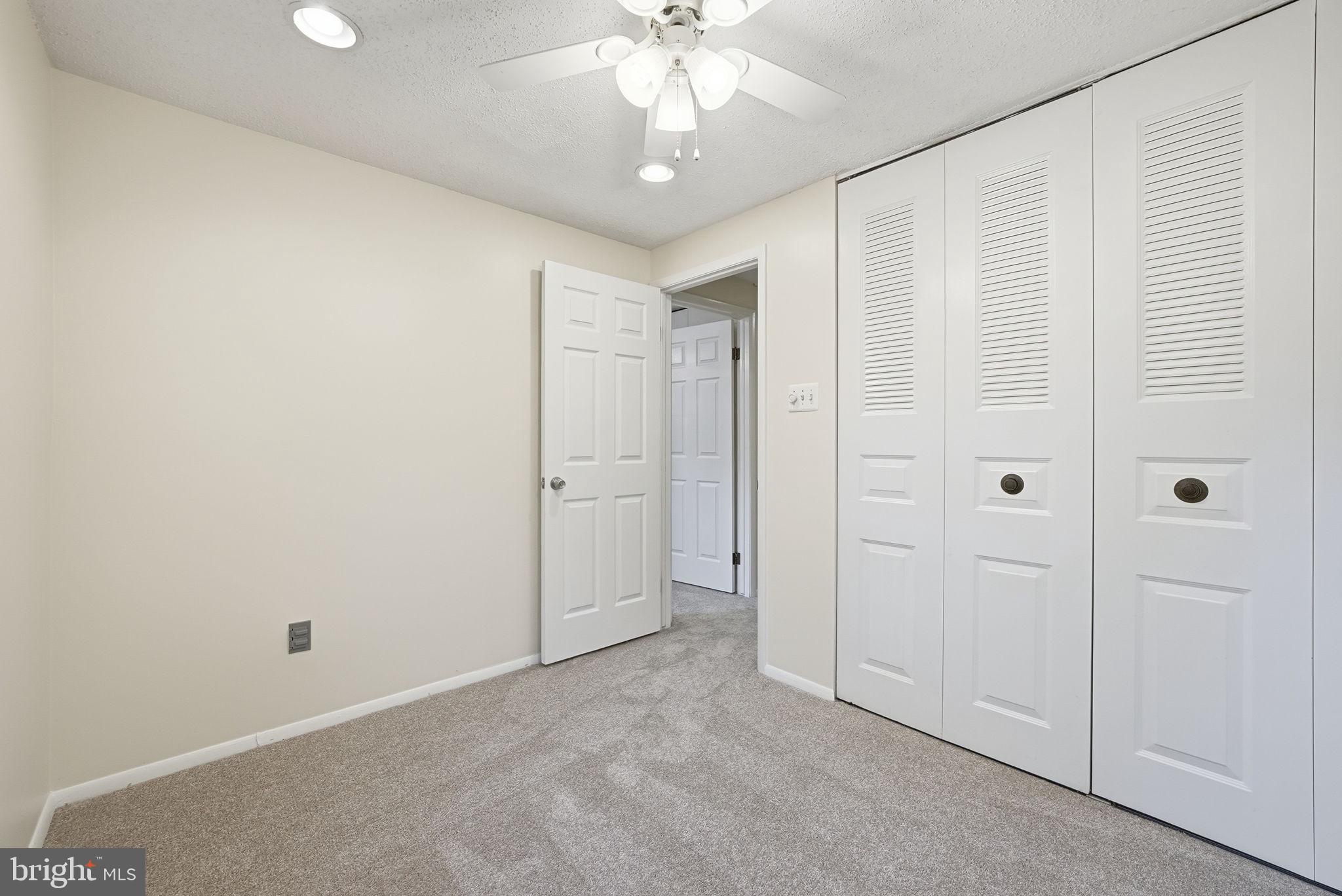 9804 Gabon Court Burke, VA 22015 - Photo 22 of 30 wooden floor in an empty room