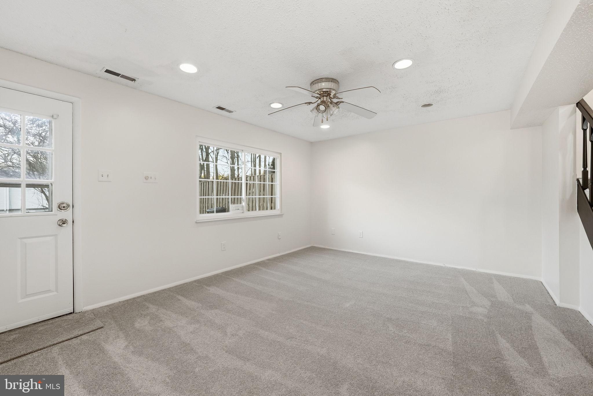 9804 Gabon Court Burke, VA 22015 - Photo 24 of 30 a view of an empty room with a window