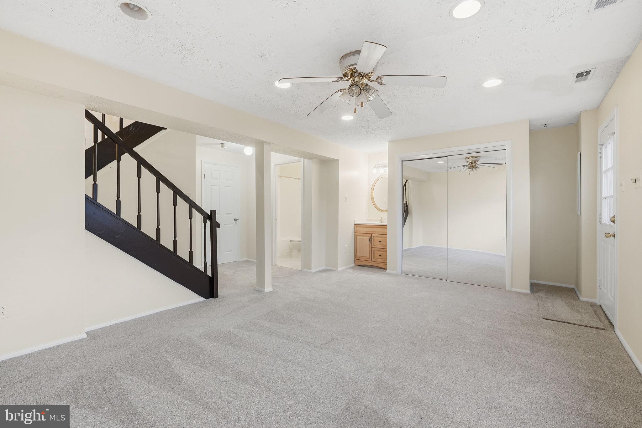 9804 Gabon Court Burke, VA 22015 - Photo 25 of 30 a view of a hallway with closet