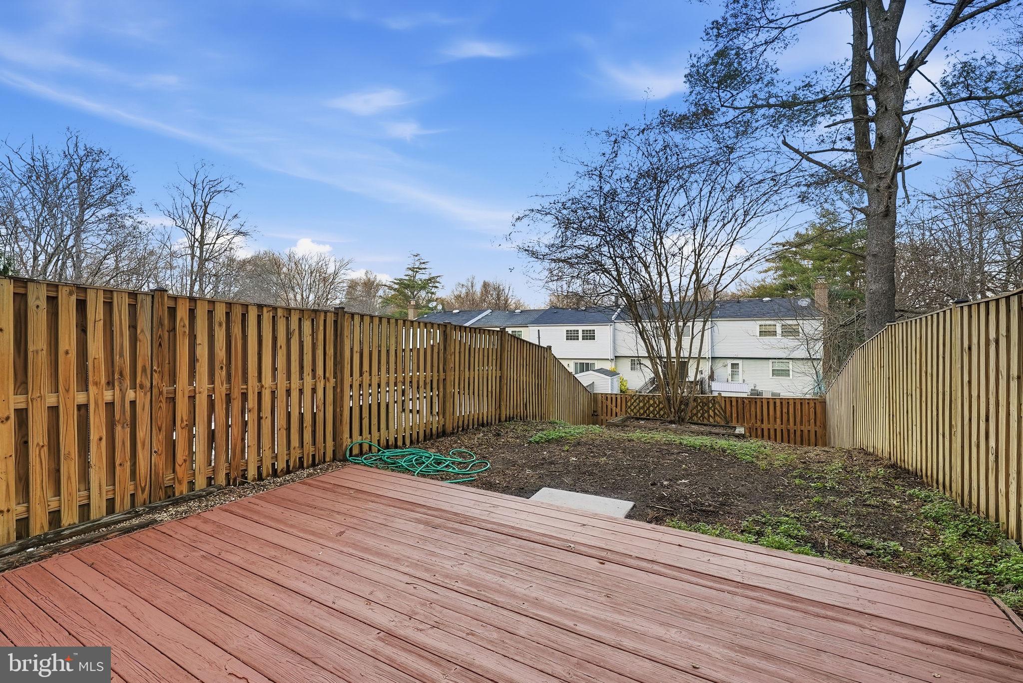 9804 Gabon Court Burke, VA 22015 - Photo 27 of 30 a view of a wooden deck