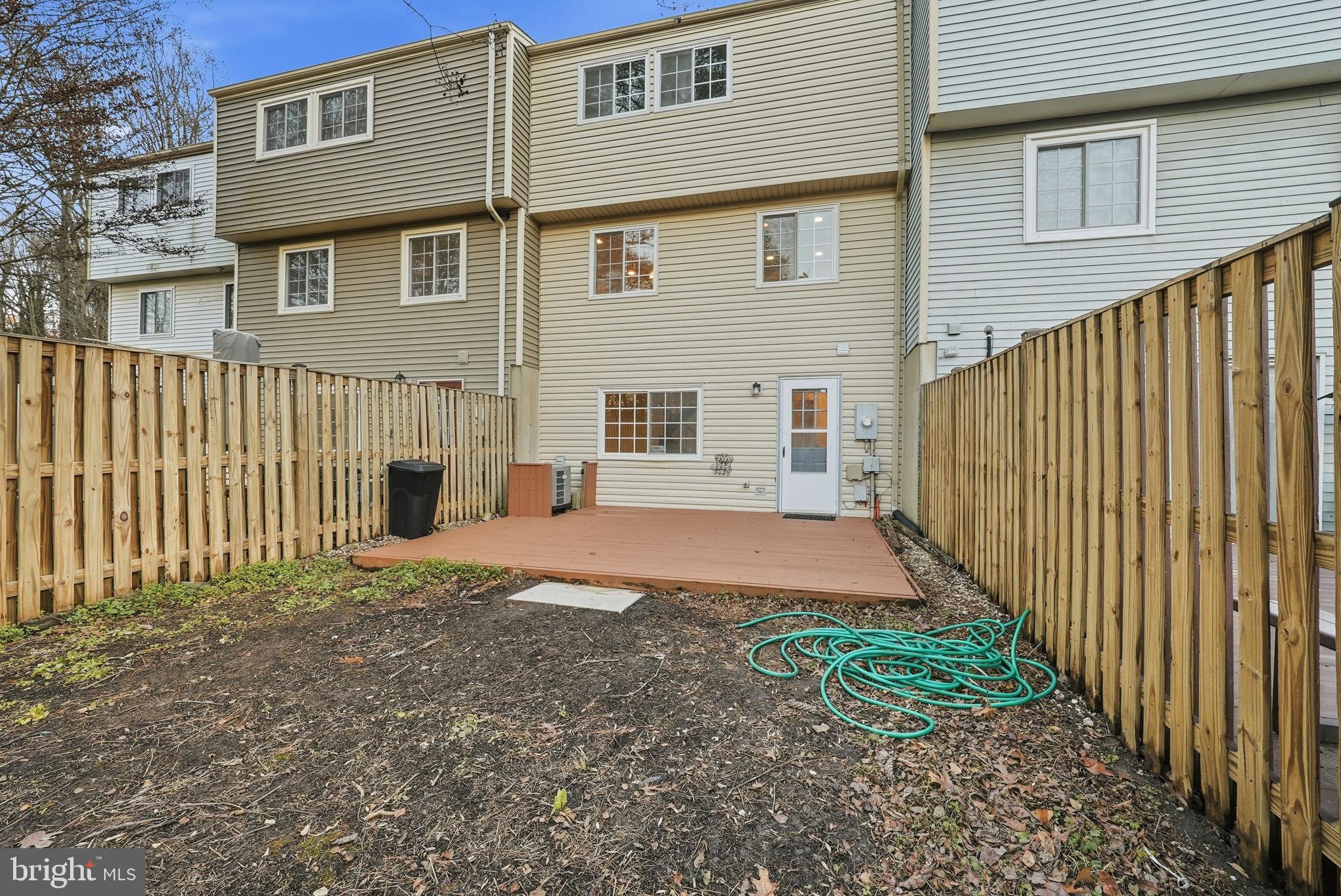 9804 Gabon Court Burke, VA 22015 - Photo 29 of 30 a front view of a house with garden