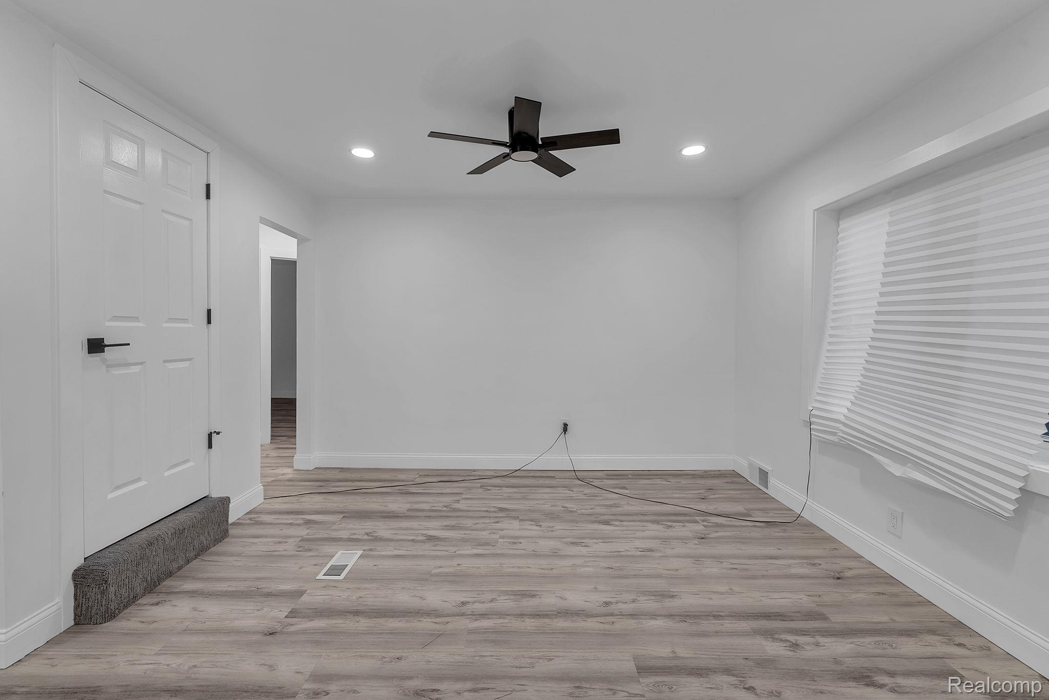 4113 Devonshire Road Detroit, MI 48224 - Photo 8 of 36 Empty room featuring light wood-type flooring, recessed lighting, and ceiling fan