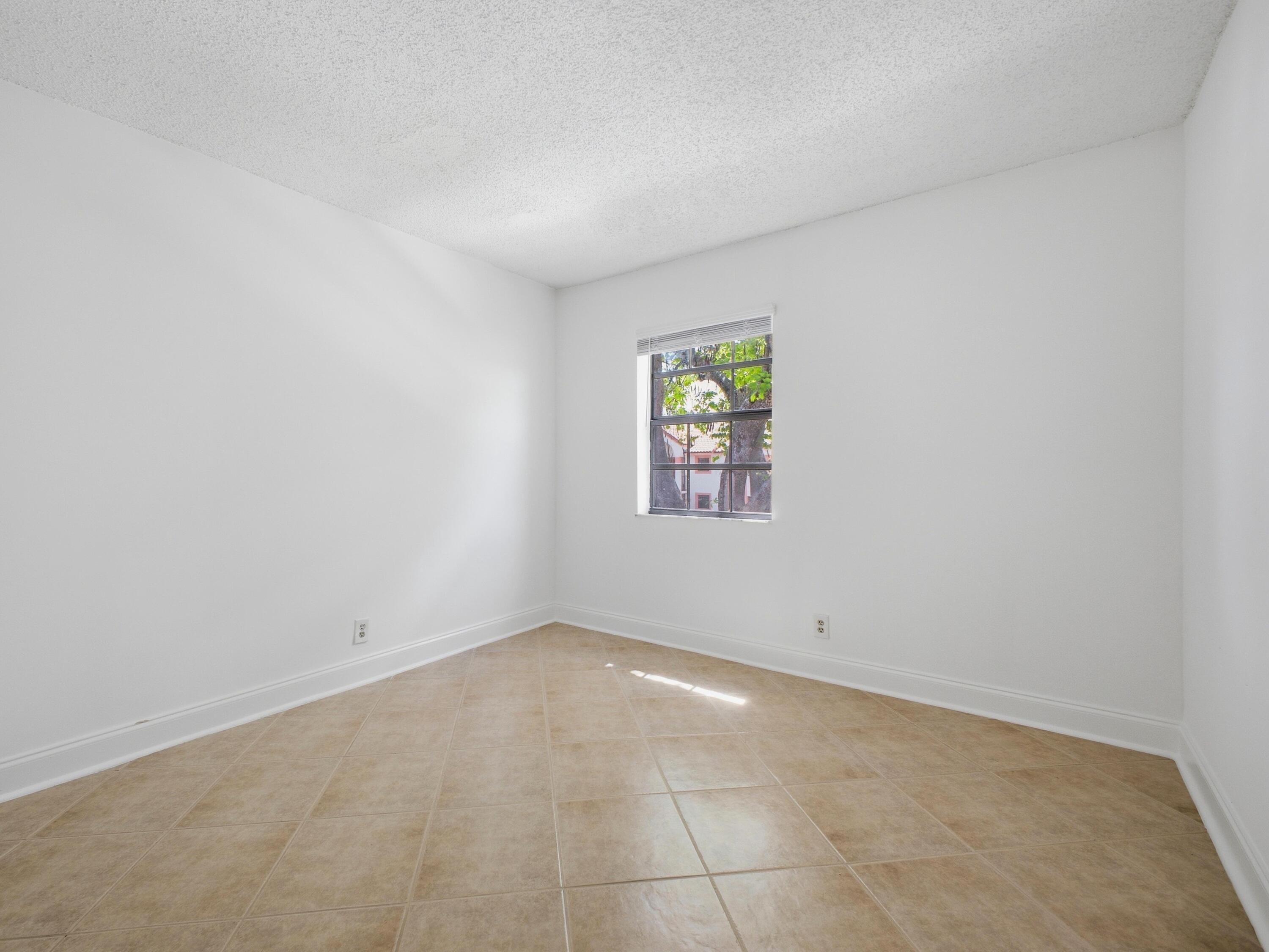 321 Norwood Terrace, Unit N221 Boca Raton, FL 33431 - Photo 18 of 36 Guest Bedroom