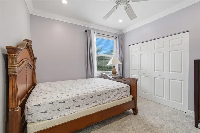 a view of a room with window and furniture