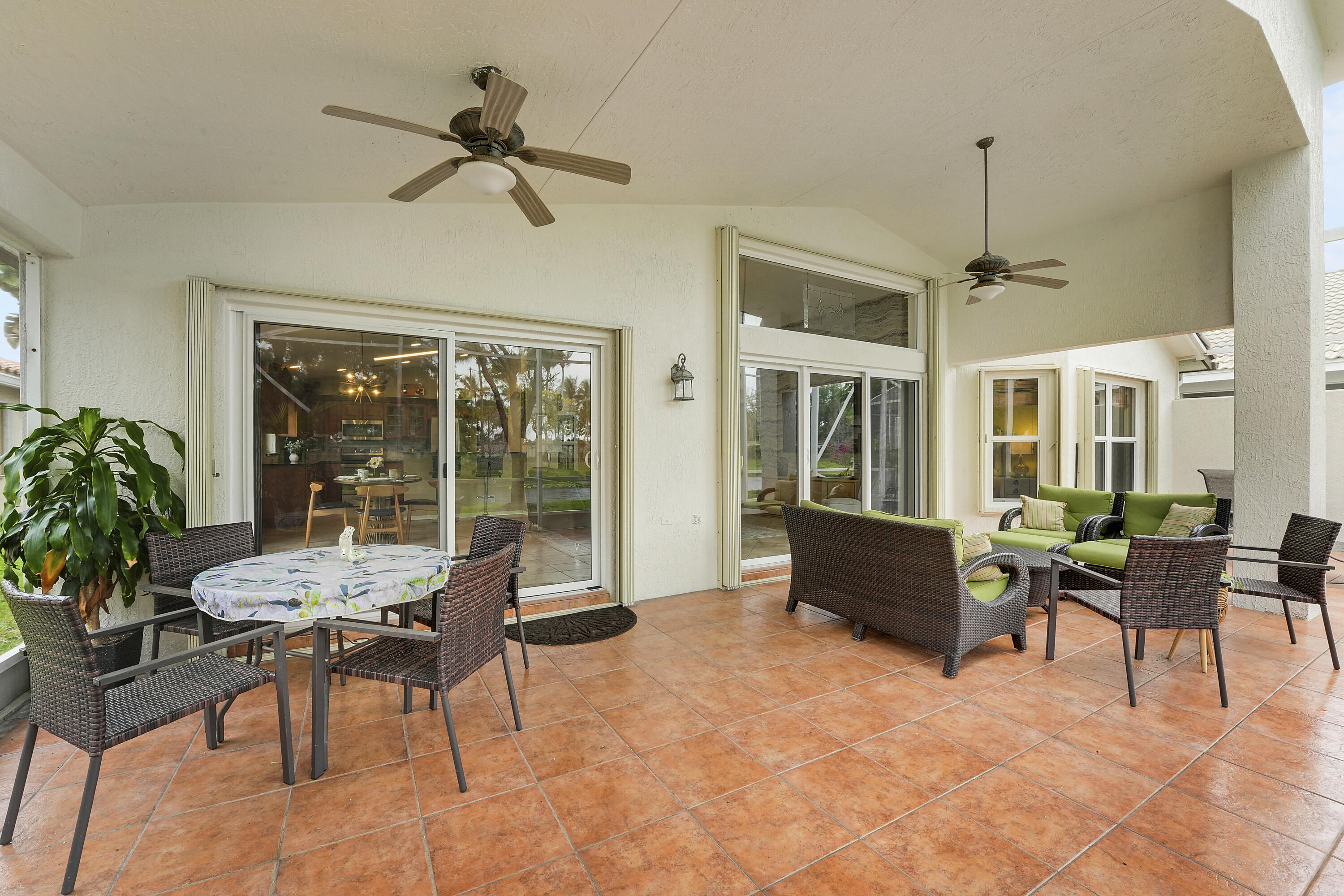 6818 Rienzo Street Wellington, FL 33467 - Photo 28 of 63 Extended Lanai