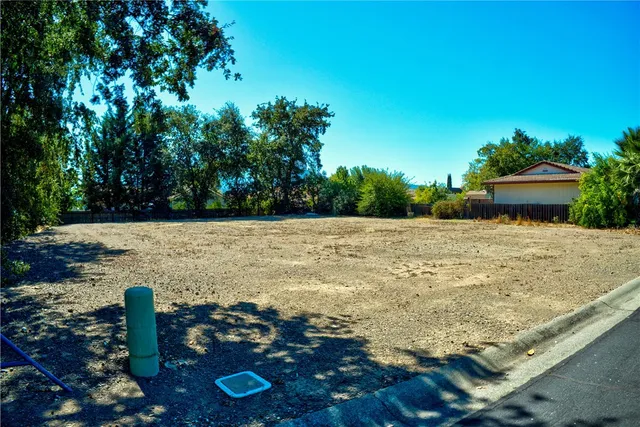 a view of a lake with a yard