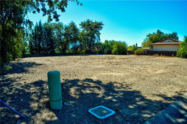 a view of a lake with a yard