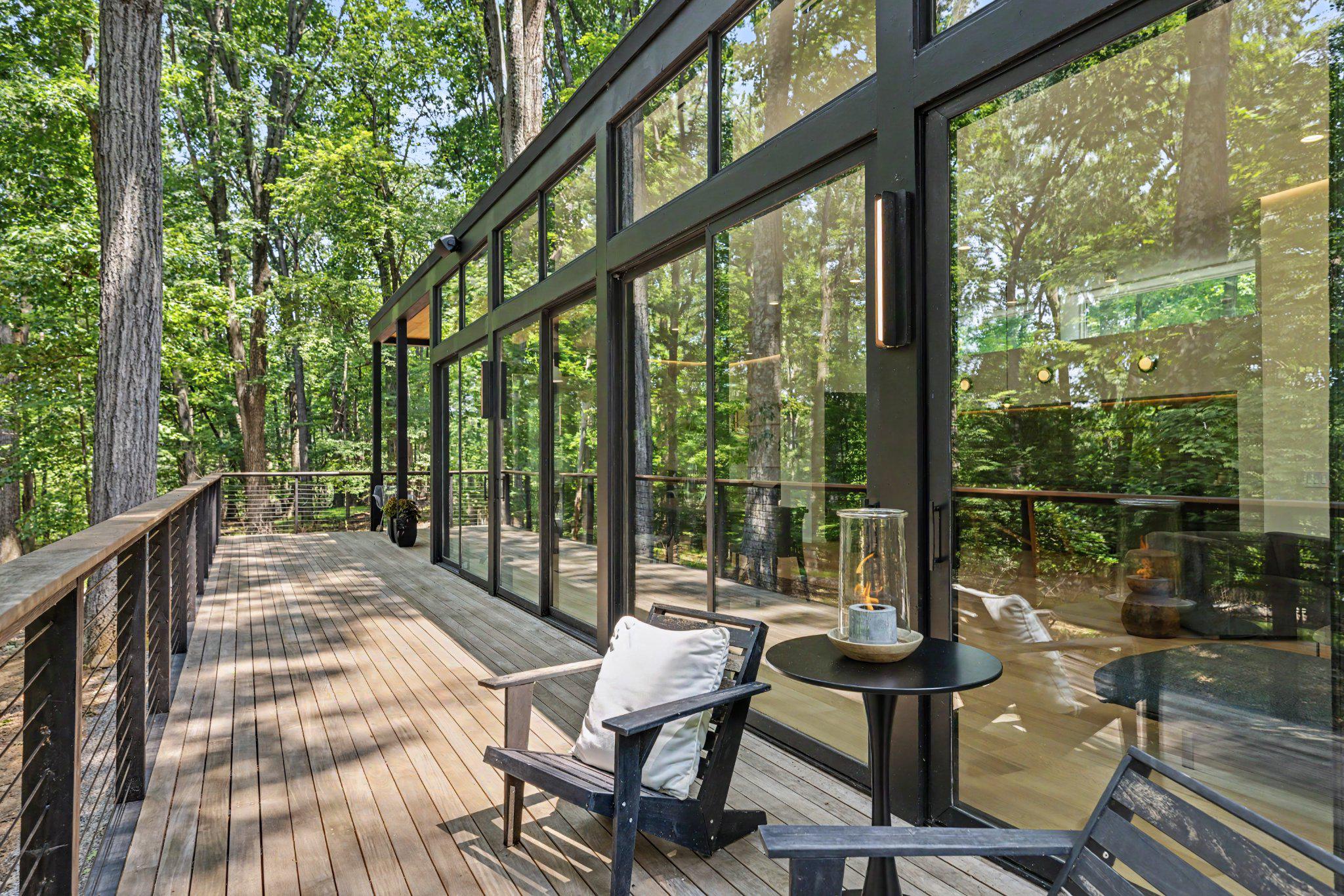 74 Brookville Hollow Road Stockton, NJ 08559 - Photo 51 of 54 Serene deck amid lush greenery.