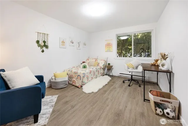 a living room with furniture and a window