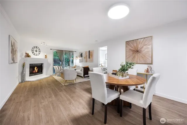 a view of a livingroom with furniture and a fireplace