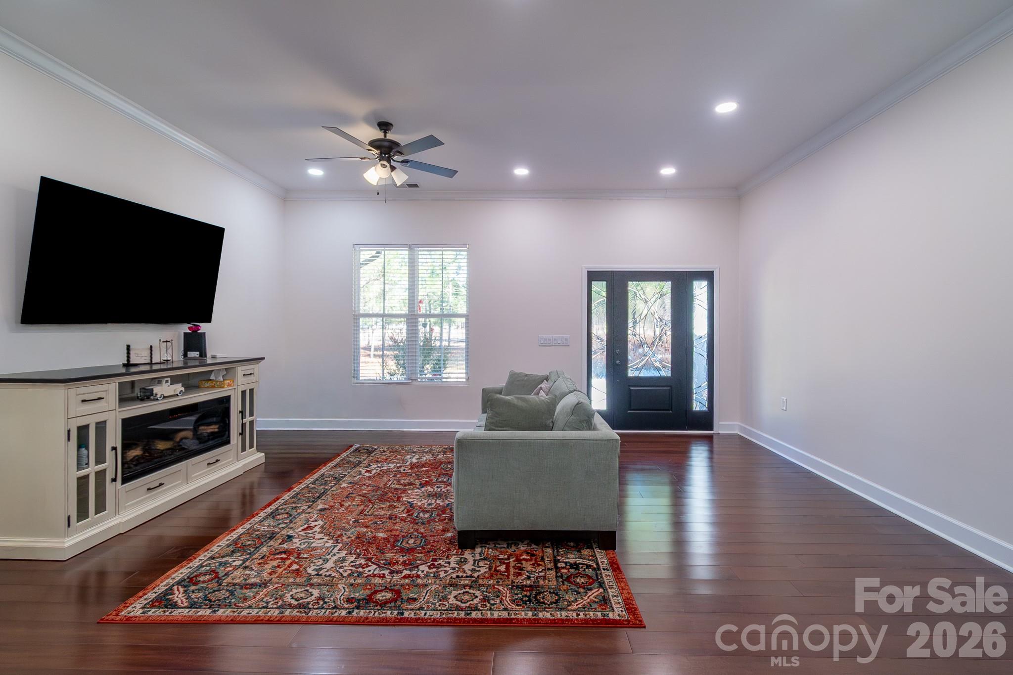 2038 Billy Jordan Road Pageland, SC 29728 - Photo 16 of 45 a living room with furniture and a flat screen tv