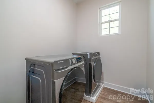 a utility room with dryer and washer
