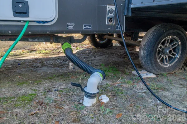 a backyard of a house with barbeque oven