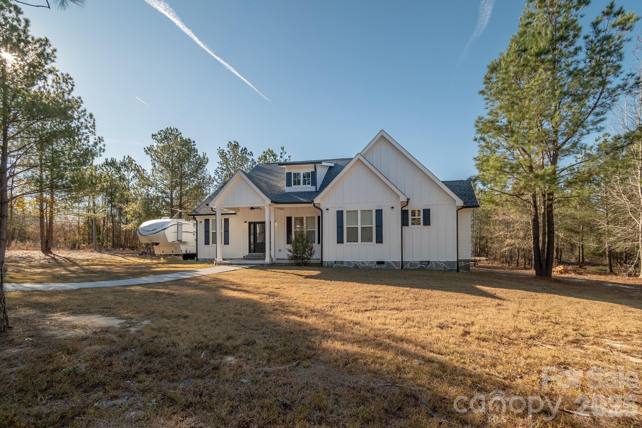 2038 Billy Jordan Road Pageland, SC 29728 - Photo 42 of 45 a view of a house with a yard