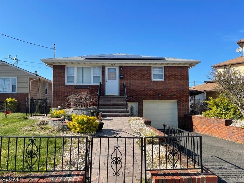 a view of a patio with table and chairs