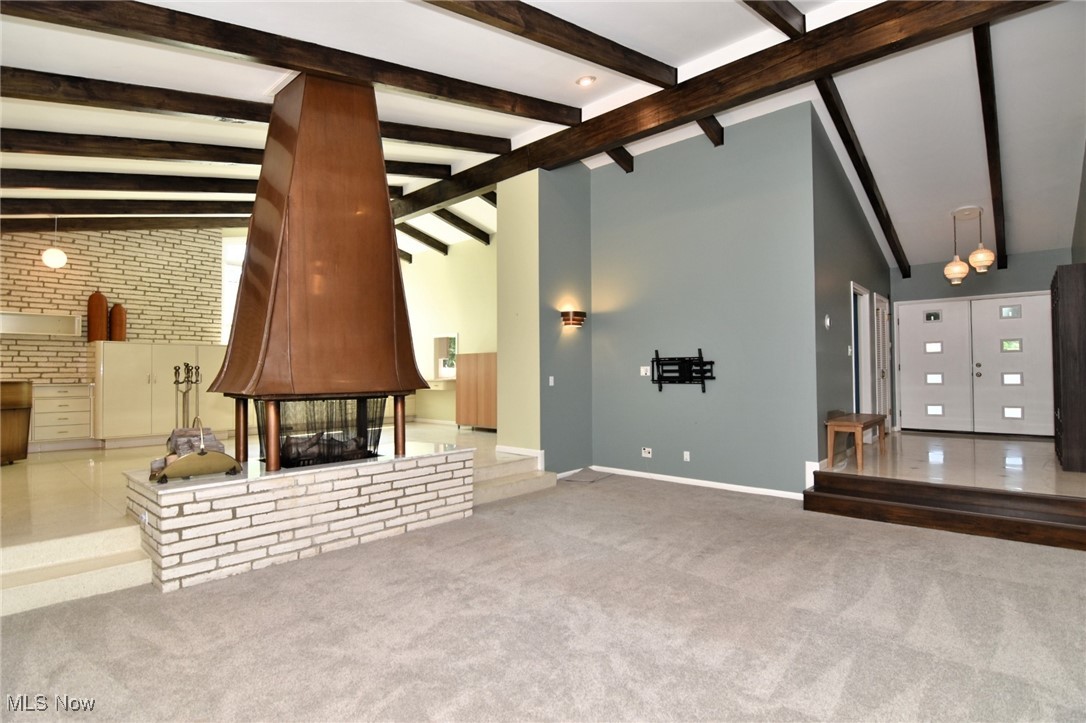 2793 Belgrave Road Cleveland, OH 44124 - Photo 11 of 40 Great room featuring fire place and beam ceilings