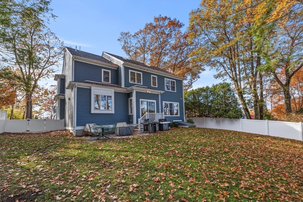 217 Hillcrest Road Needham, MA 02492 - Photo 17 of 17 a front view of a house with a yard