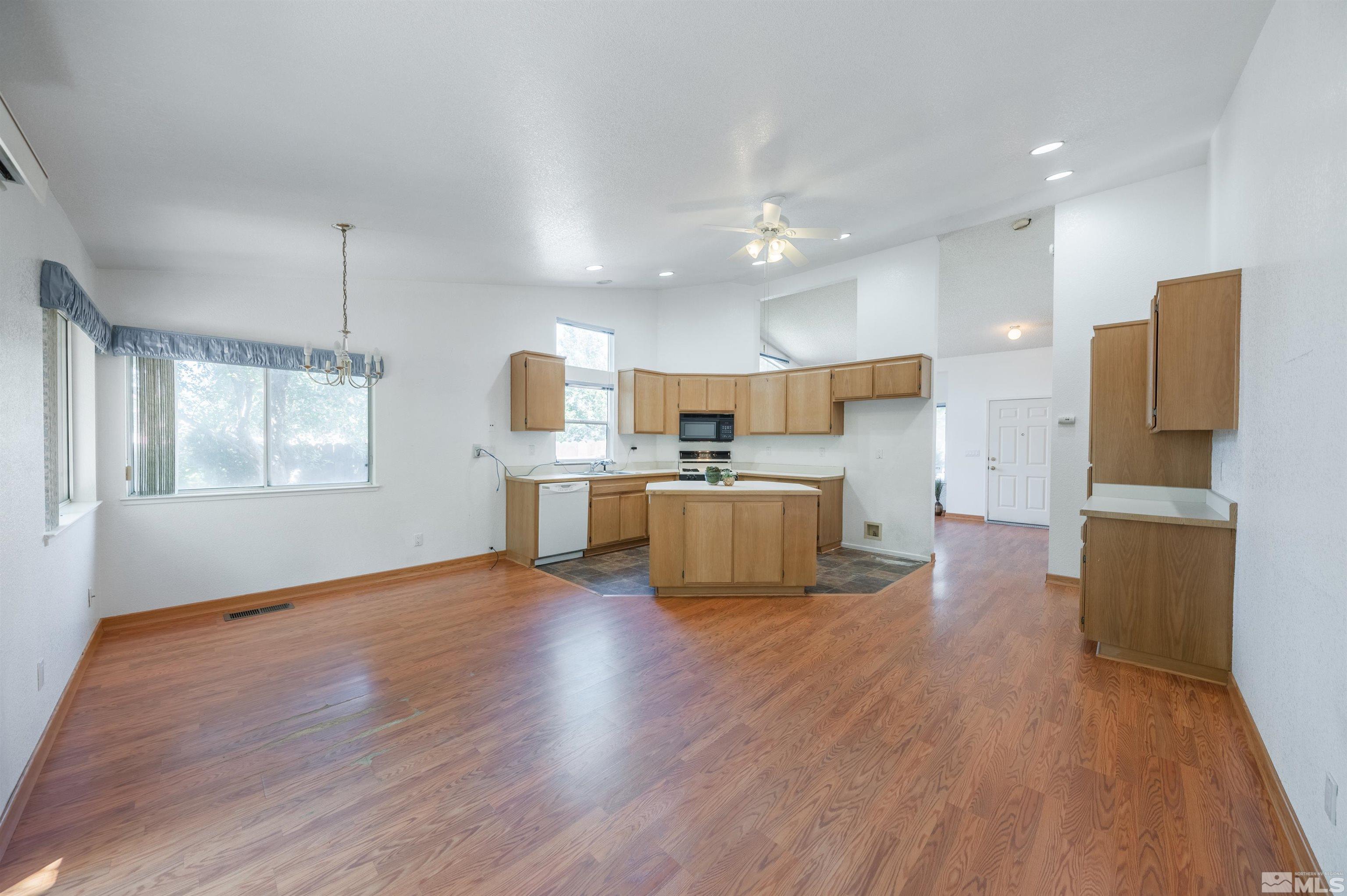7675 Pickering Circle Reno, NV 89511 - Photo 9 of 28 a view of kitchen with wooden floor