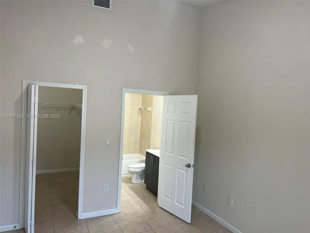 a bathroom with a toilet