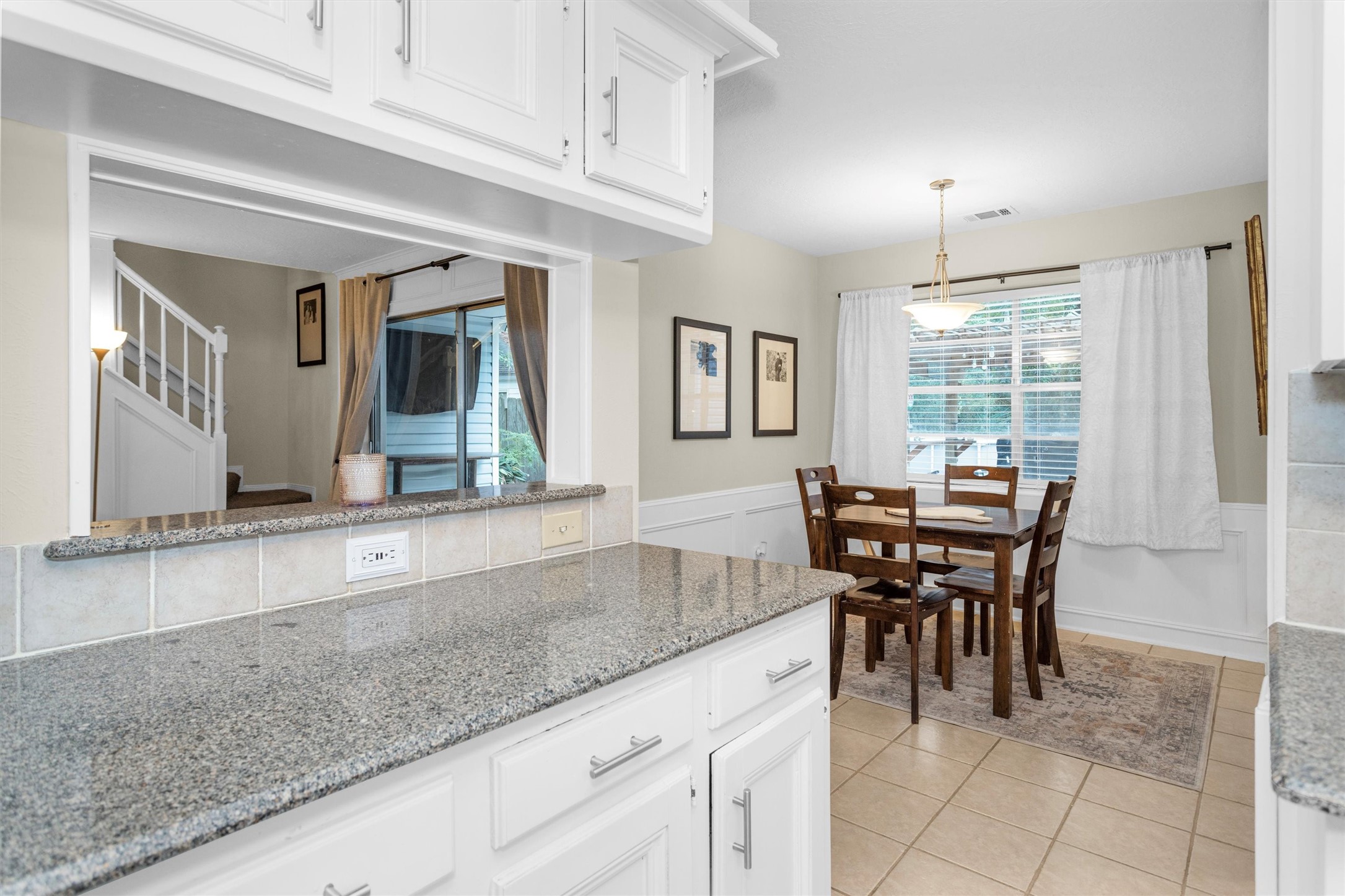 2005 Tickner Street Conroe, TX 77301 - Photo 16 of 50 Updated granite countertops in kitchen.