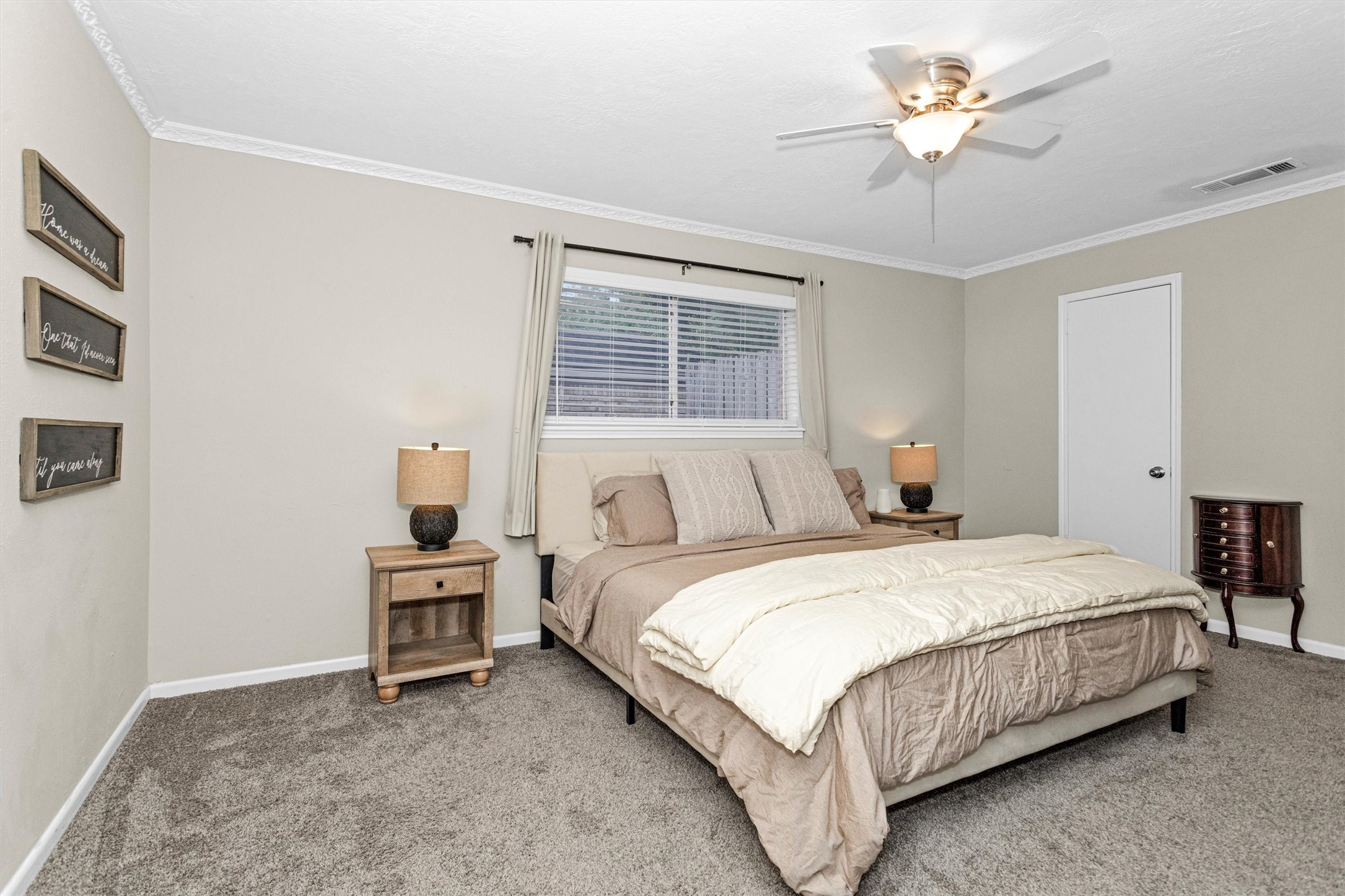 2005 Tickner Street Conroe, TX 77301 - Photo 24 of 50 Primary Bedroom - large and spacious with plenty of room.