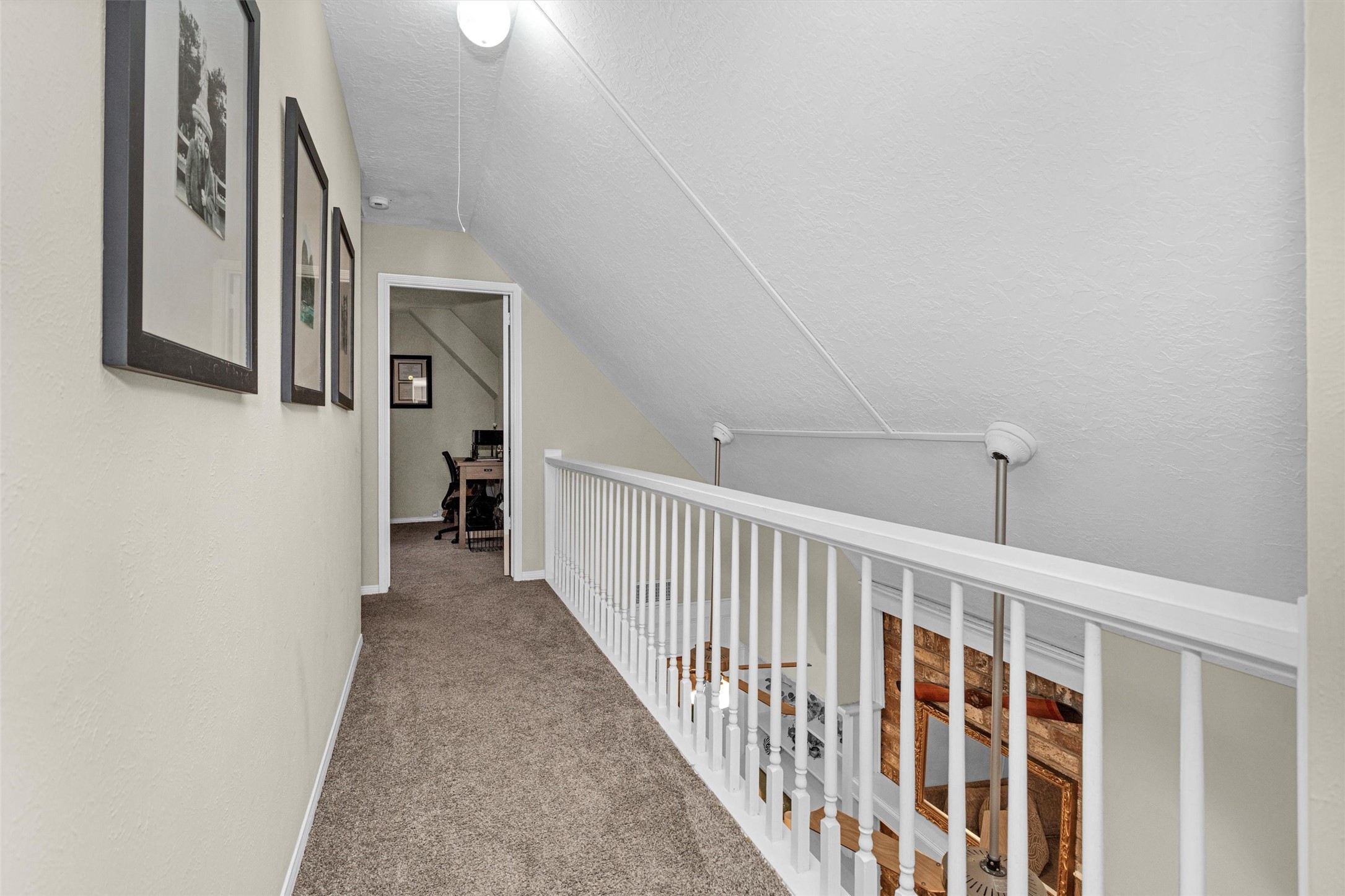 2005 Tickner Street Conroe, TX 77301 - Photo 30 of 50 Upstairs hall to secondary bedrooms