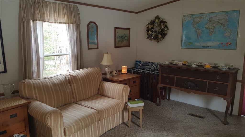 918 Springy Pond Road Otis, ME 04605 - Photo 3 of 8 Neat and cared for living area