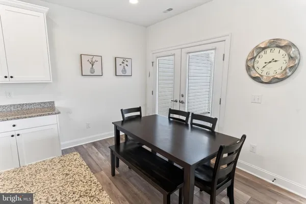 a view of a workspace with furniture