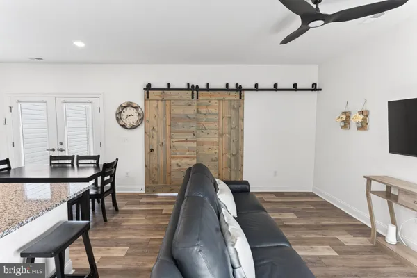 a view of a hallway with seating area
