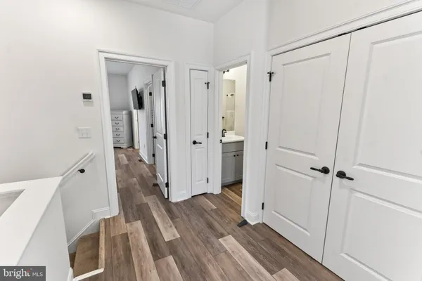 a view of a bathroom with a sink and shower