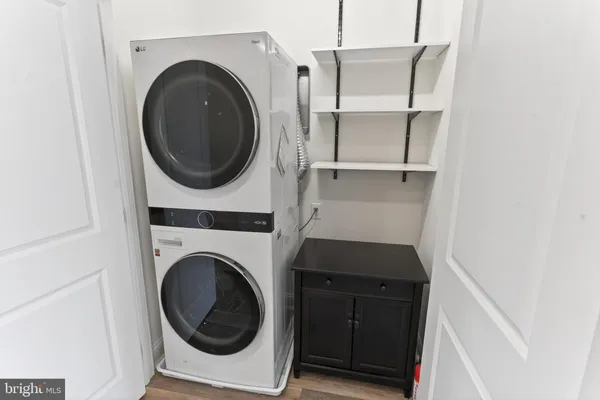 a utility room with dryer and washer